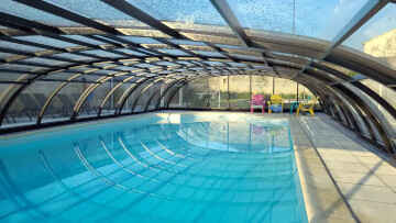 Heated coverable swimming pool