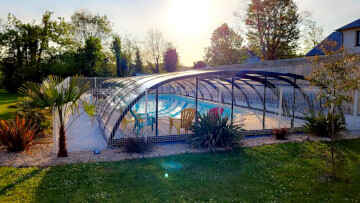 Heated coverable swimming pool